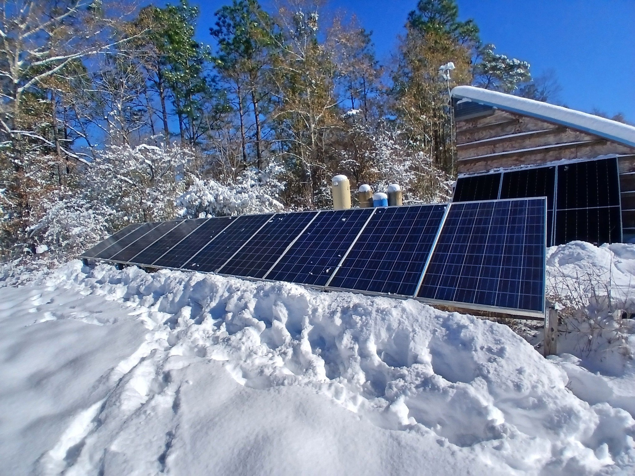 Solar modules cleared of snow.